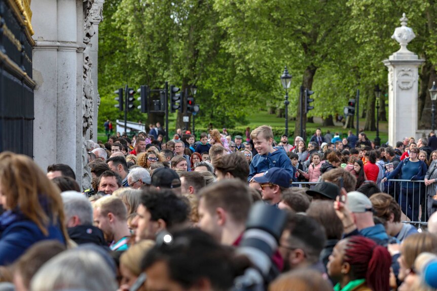 A sea of crowds in London gathering outside the gates of Buckingham palace