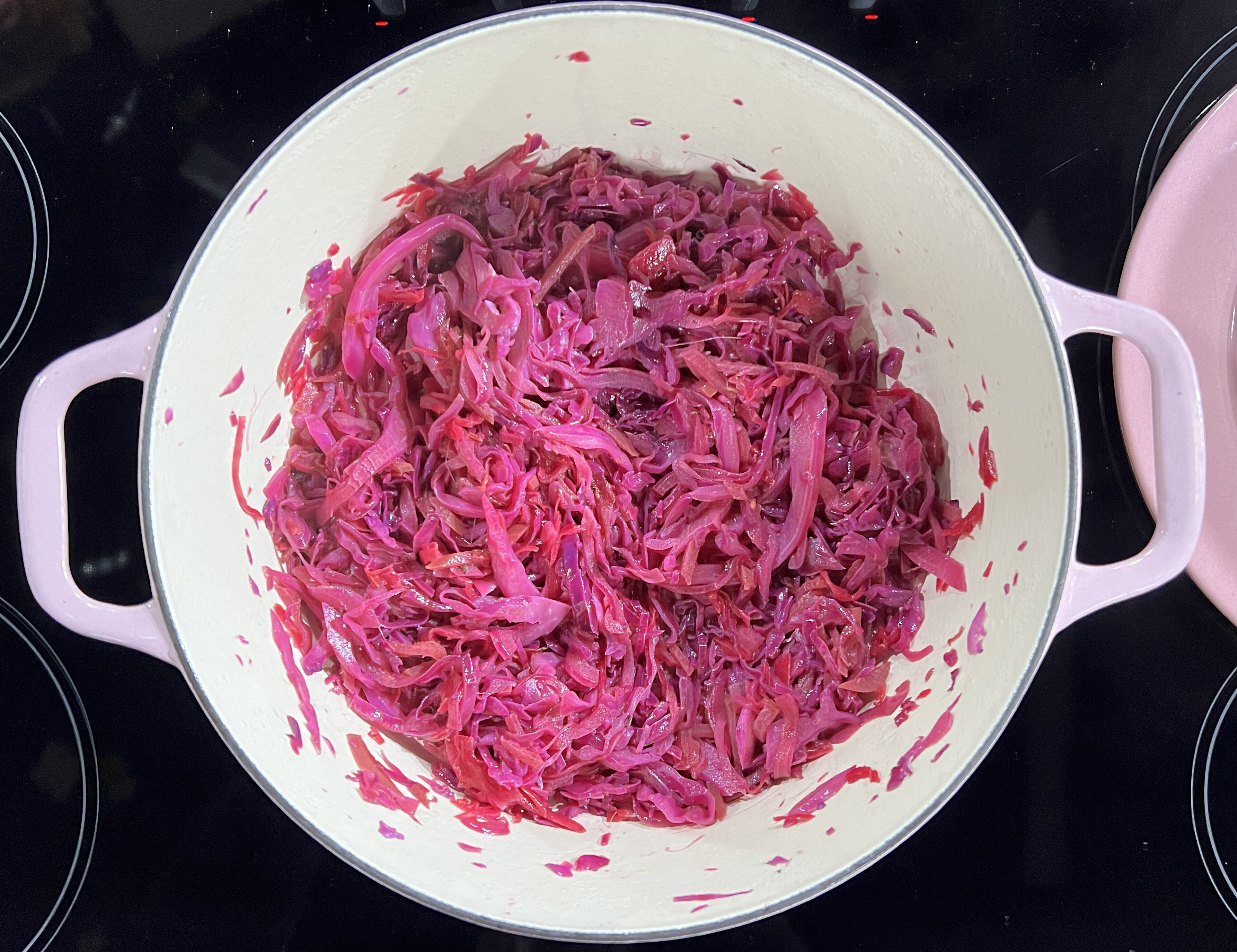Red cabbage and apple reducing in a pot