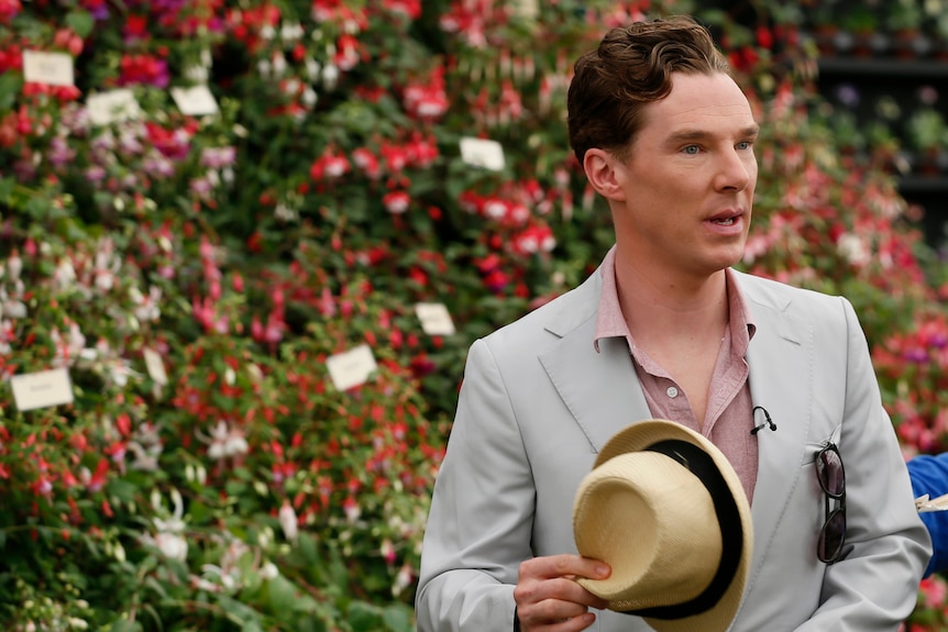 Benedict Cumberbatch holding a hat