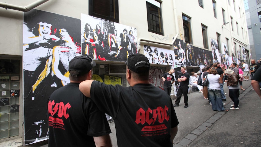 AC/DC fans congregate in AC/DC Lane in Melbourne's CBD before a concert.