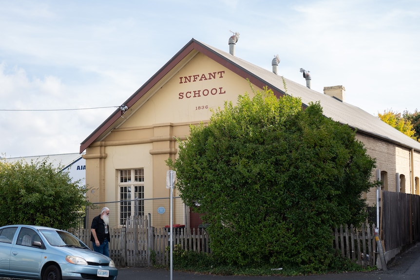 An old building with "infant school" written on top.