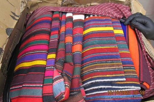 Traditional Afghan garments in a box