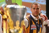 Lance 'Buddy' Franklin looks longingly at the premiership cup
