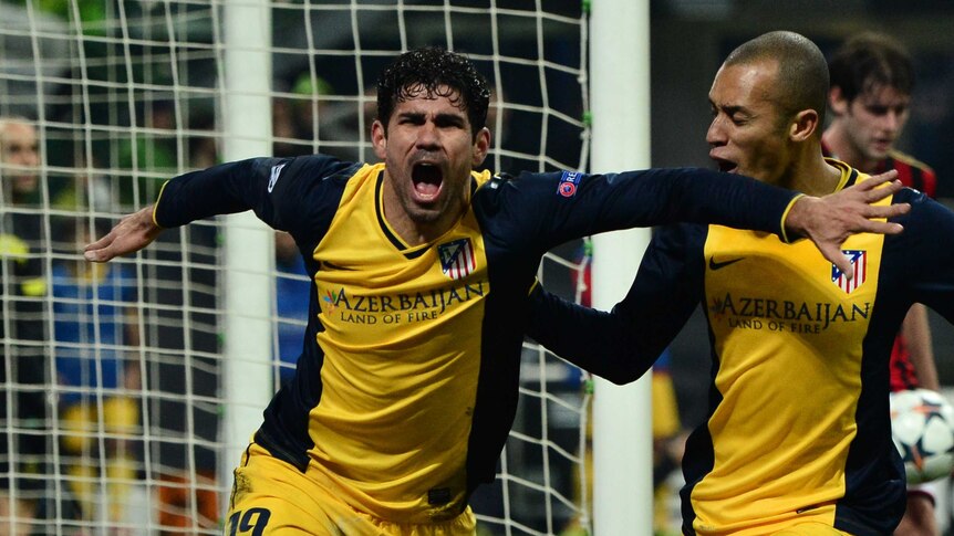 Diego Costa celebrates a Champions League goal against AC Milan