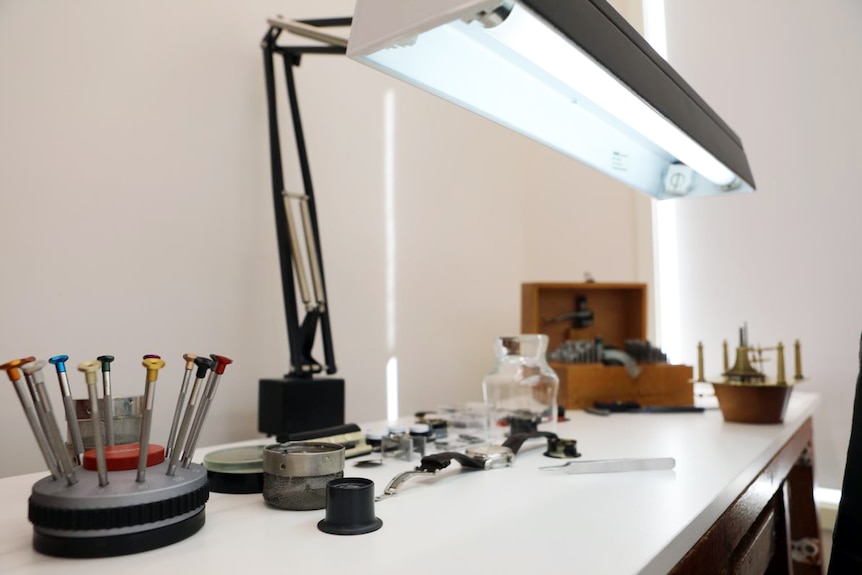 Clock components on a desk