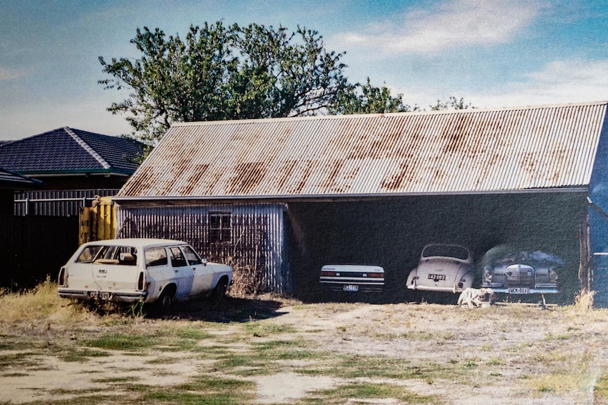 Several cars and a shed at the property of Allan Chamberlain.