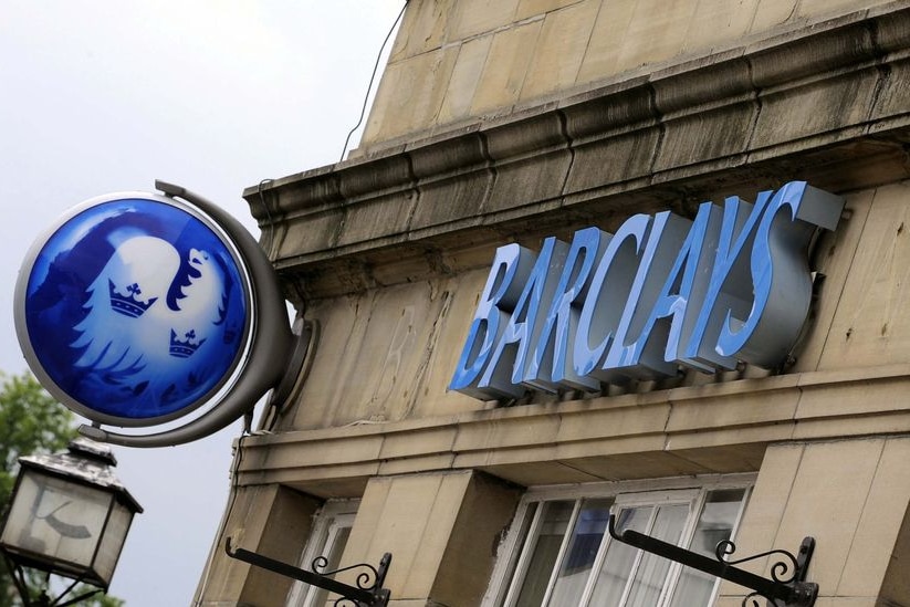 A Barclays Bank sign sits outside a branch