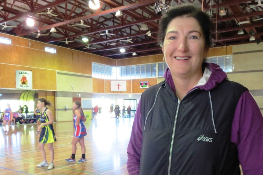 Woman on netball court