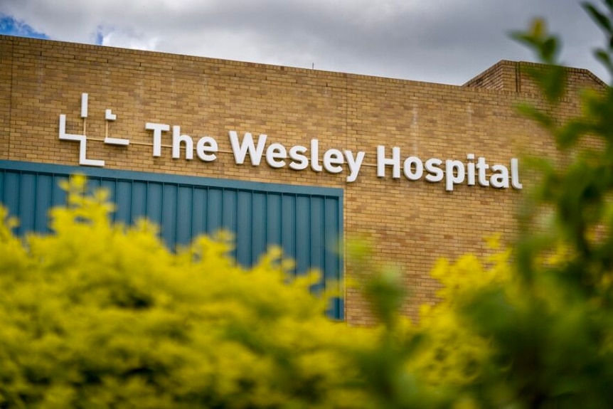 A sign marks The Wesley Hospital.