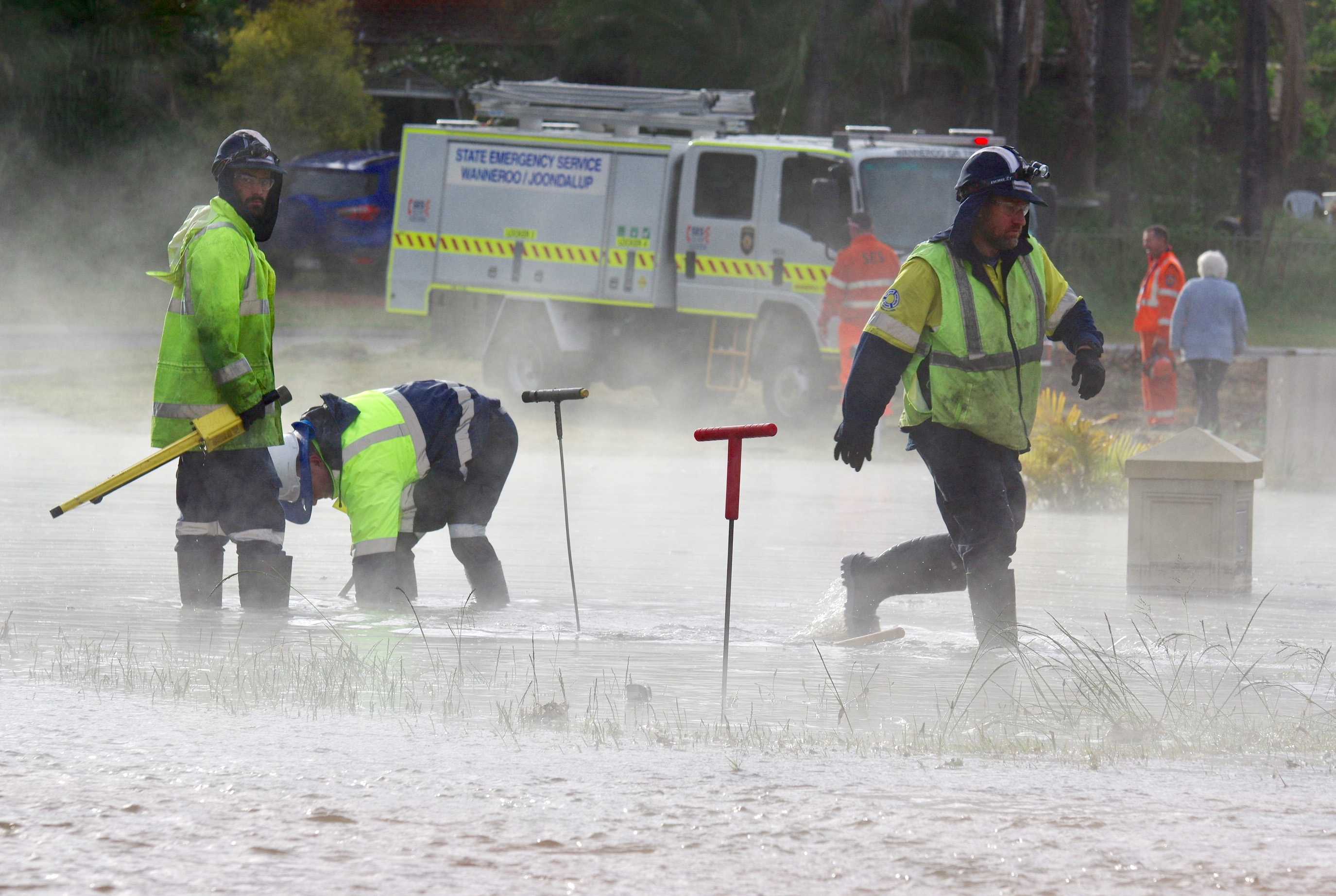 Burst water main floods street, causes sink hole in northern Perth