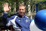 Johnson rides in the AFL parade