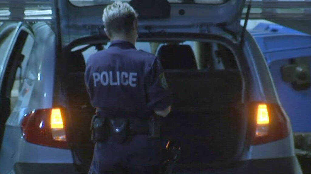 Flaming car crashes into Sydney police station car park - ABC News
