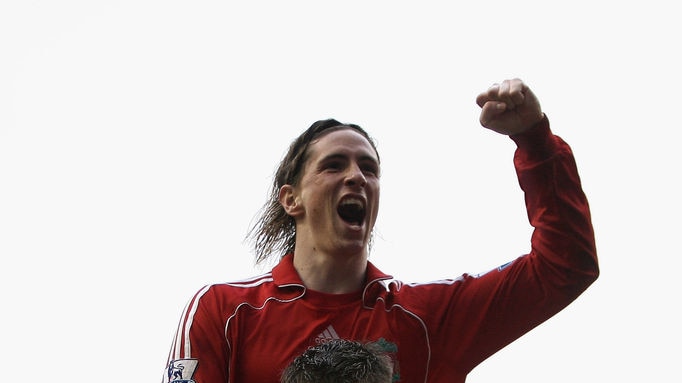 Deadly double act... Steven Gerrard and Fernando Torres celebrate after the Reds' third goal