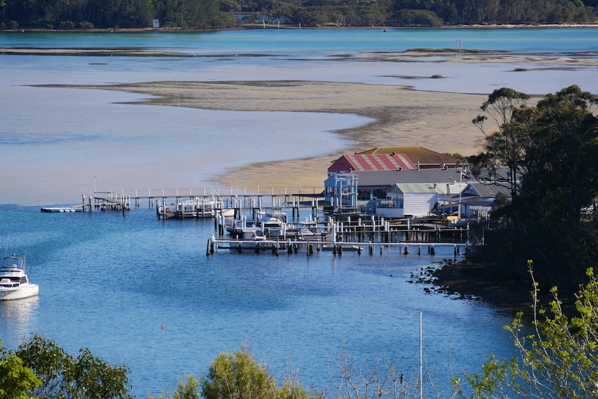 a picture of a jetty against a salt water lake