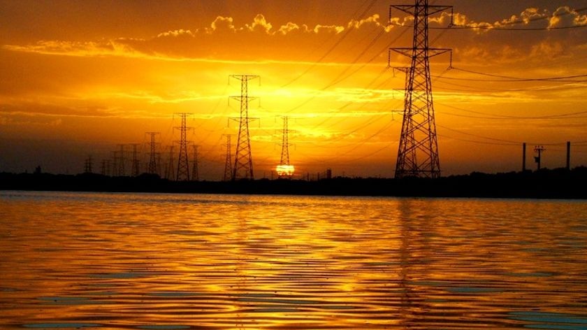 Power pylons at sunset