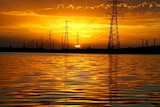 Power pylons at sunset