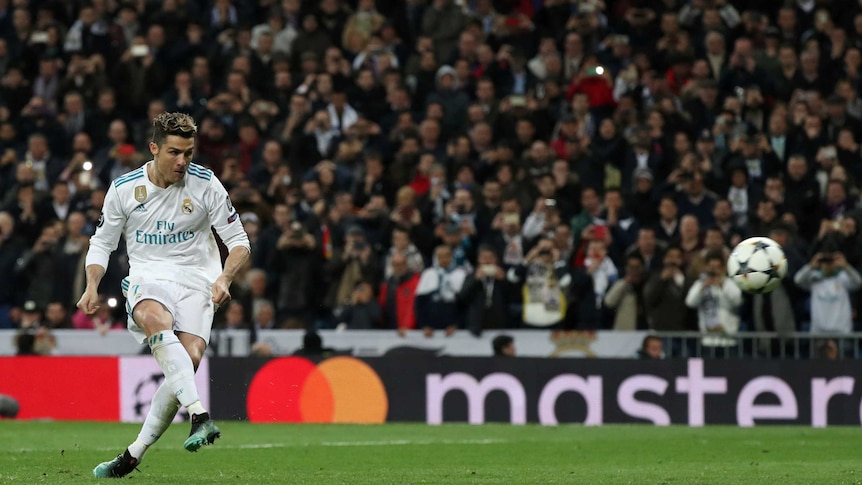 Real Madrid's Cristiano Ronaldo shoots a penalty to defeat Juventus in the Champions League quarter final