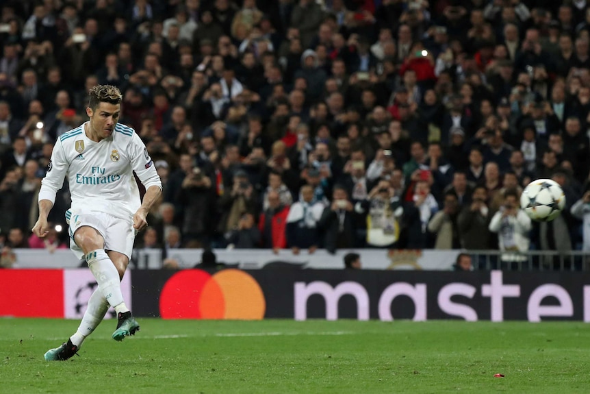 Real Madrid's Cristiano Ronaldo shoots a penalty to defeat Juventus in the Champions League quarter final