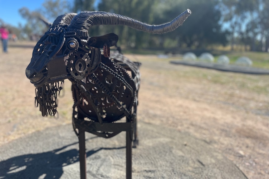 Image of a ram sculpture made out of steel.