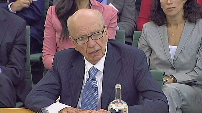 TV still of Rupert Murdoch at parliamentary inquiry into News of the World phone hacking