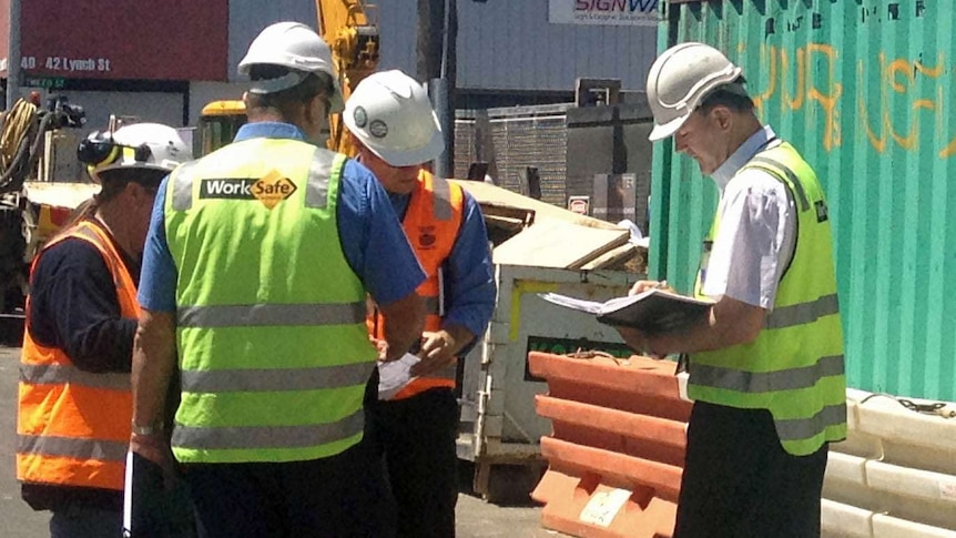 WorkCover inspectors at industrial accident site