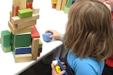Children play with toys at a preschool