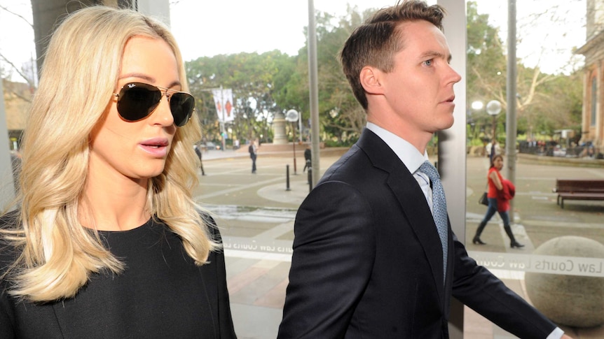 Stockbroker Oliver Curtis and his wife Roxy Jacenko arrive at the NSW Supreme Court.