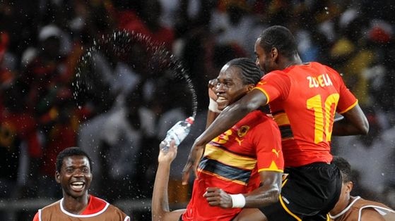 Homeland hero...Manucho's strong physical presence proved vital when he scored Angola's second.