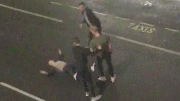 CCTV footage filmed from above shows Ben Stokes lying on the street surrounded by three men.