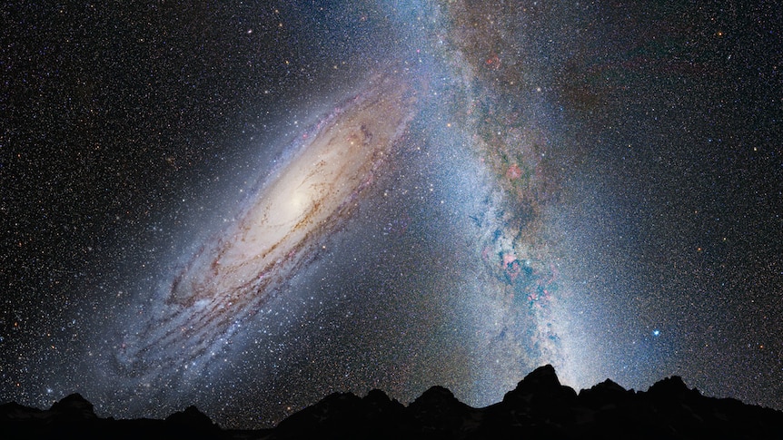 A illustration shows two plate-shaped galaxies approaching each other.