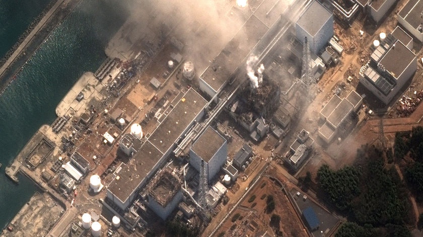 Smoke rising from the earthquake and tsunami damaged Fukushima no. 1 nuclear plant in Japan.