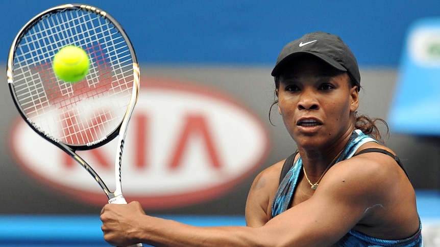 Serena Williams eyes a return during in a training session in Melbourne on January 15, 2012.