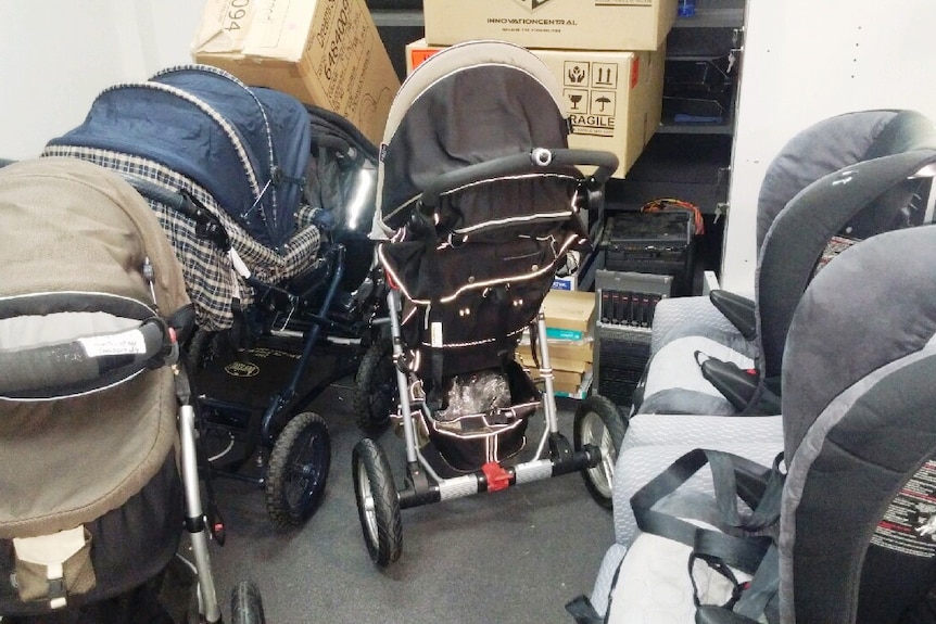 Prams and car seats waiting to be re-housed.