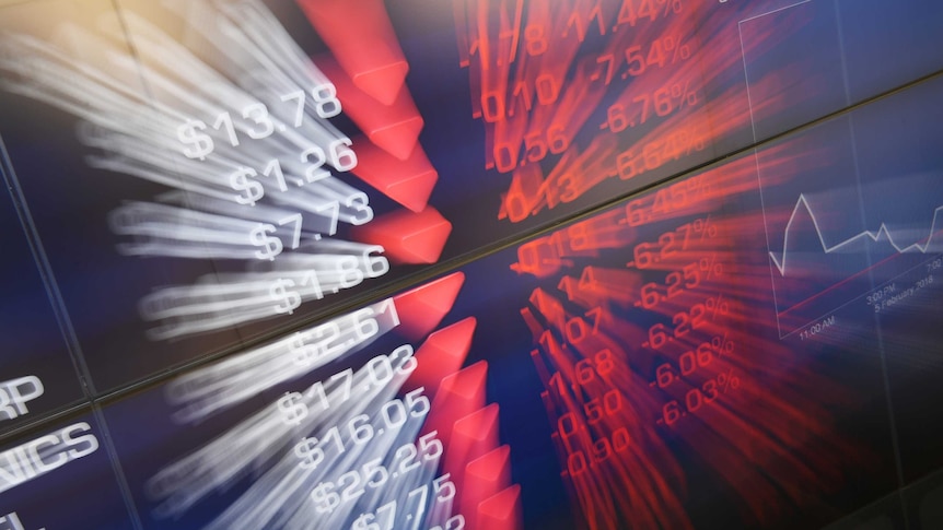 A slow shutter photograph showing a blurry market trading board at the Australia Securities Exchange.