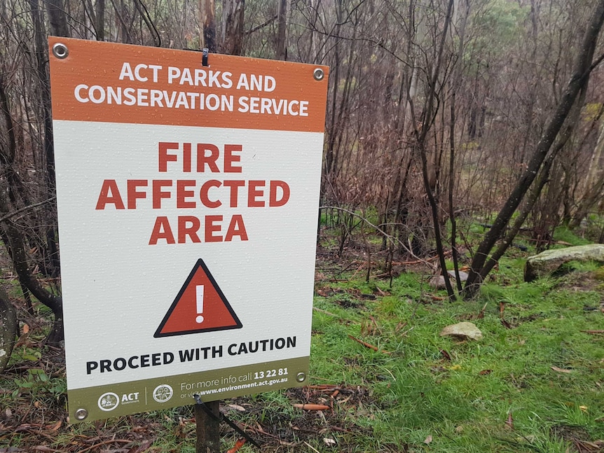 Warning sign in Namadgi National Park about the area being fire-affected.