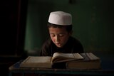 A boy reads the Quran at an Afghan madrassa, September 28, 2021.