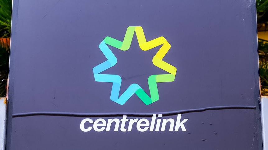 A sign displaying the centrelink and medicare logos.