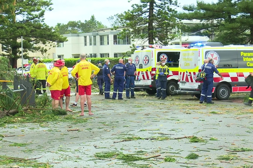 emergency personnel at a carpark