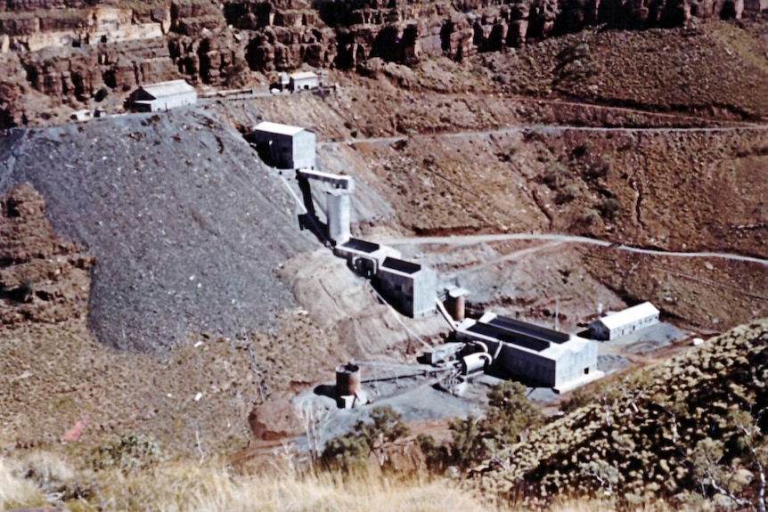 A mine constructed in the side of a gorge