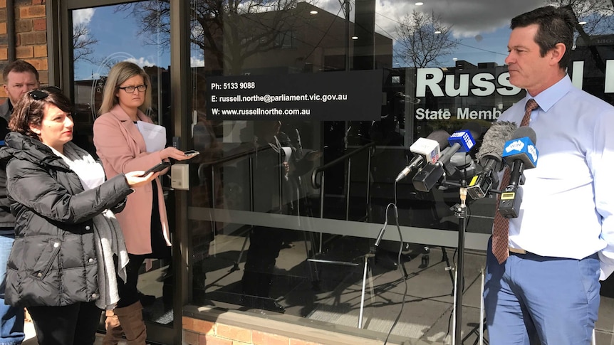 Morwell MP Russell Northe speaks to the media outside his office in Morwell, Victoria.