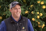 Farmer laughing about the look of yuzu