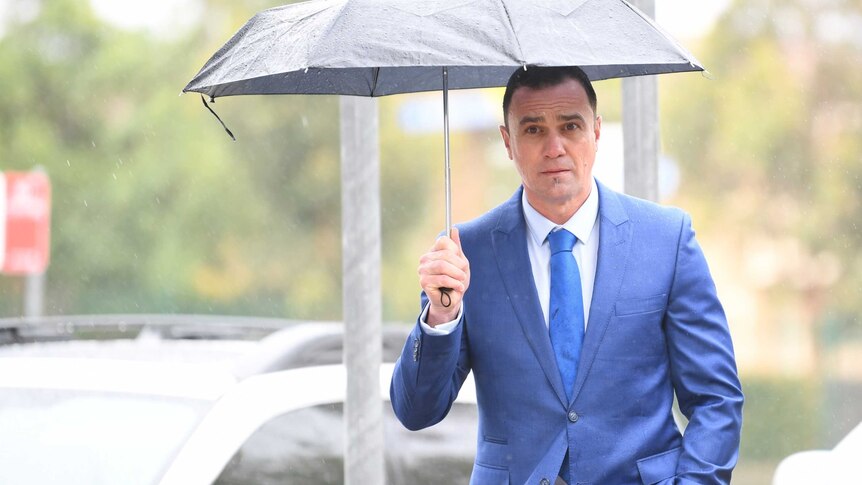 Shannon Noll arrives at Sutherland Local Court.