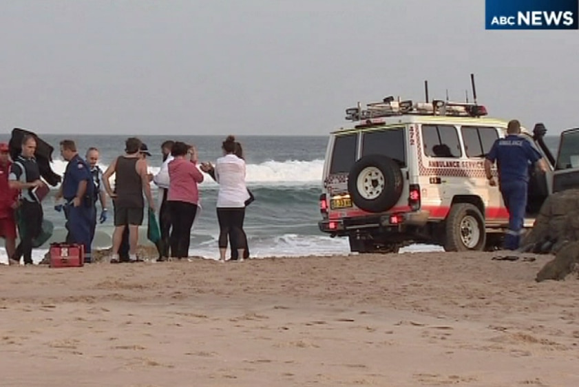 Paramedics at the scene of a shark attack at Lighthouse Beach