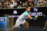 Matthew Ebden of Australia in action against John Isner in the Australian Open.