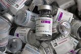 Empty vials of the AstraZeneca COVID-19 vaccine lie in a box