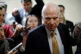 US senator John McCain (R-AZ) talks to reporters