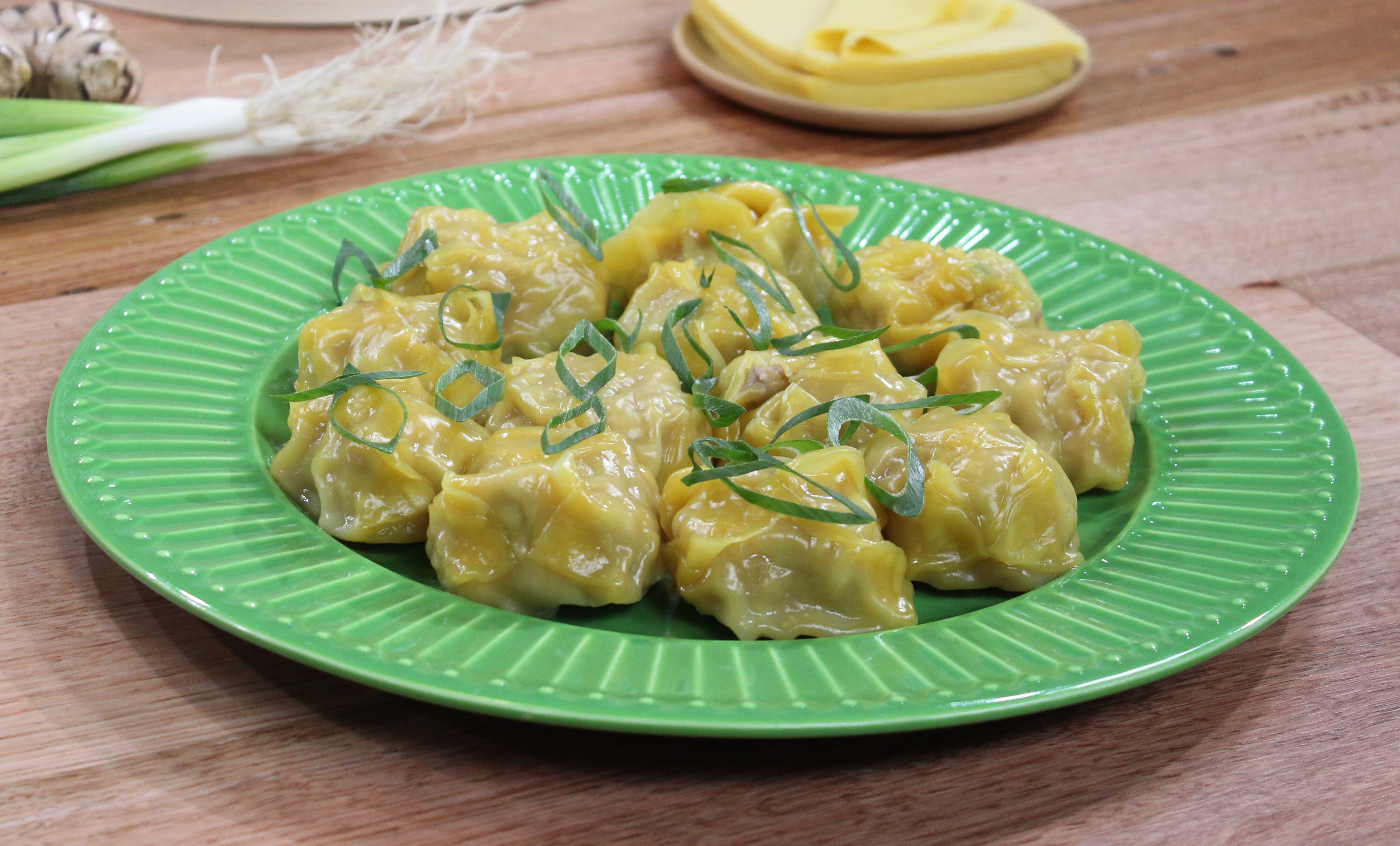 finished dish of pork and cabbage dim sims on serving plate