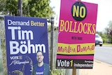 Two roadside signs spruiking independent and minor-party candidates.