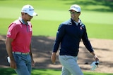 Adam Scott and Jason Day during a pre-Masters practice round at Augusta