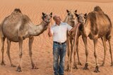 Alex Tinson with camels